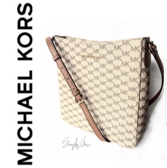 Michael Kors Handbags - NWT authentic MK monogram messenger bag